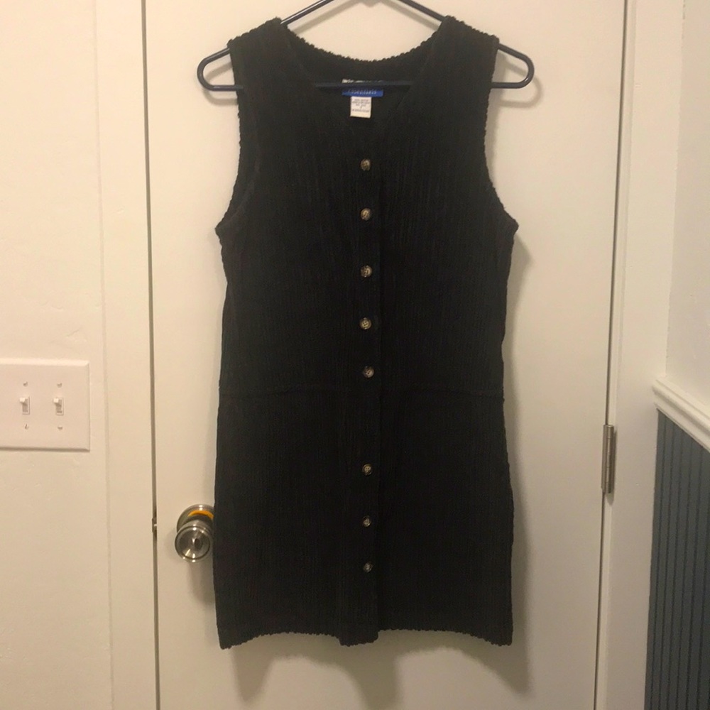 A slick black button up dress